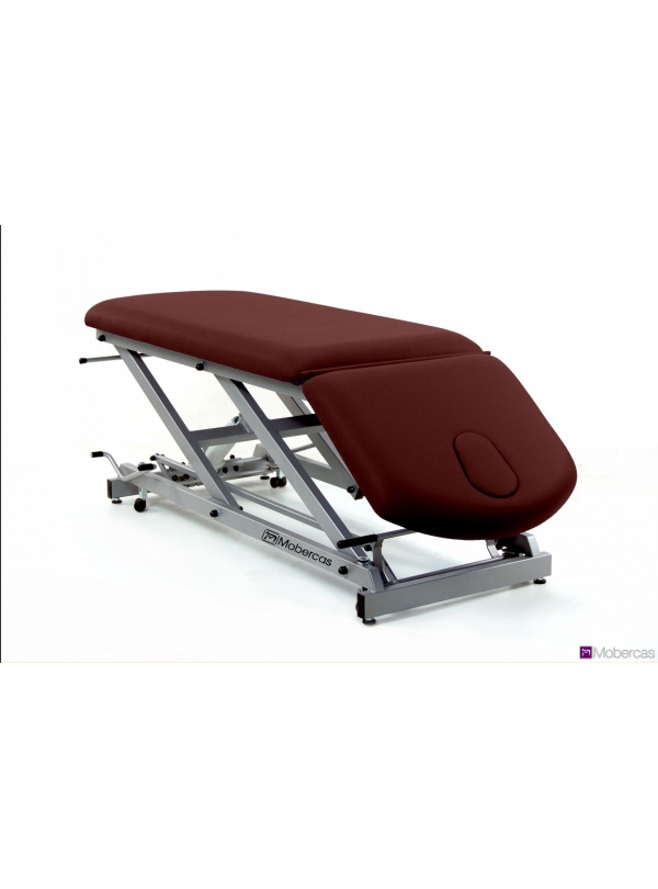 Camilla de reconocimiento hidráulica de 2 secciones con portarrollos, ruedas y tapón facial.